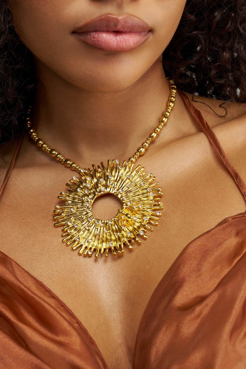 MATTE GOLD STARBURST NECKLACE