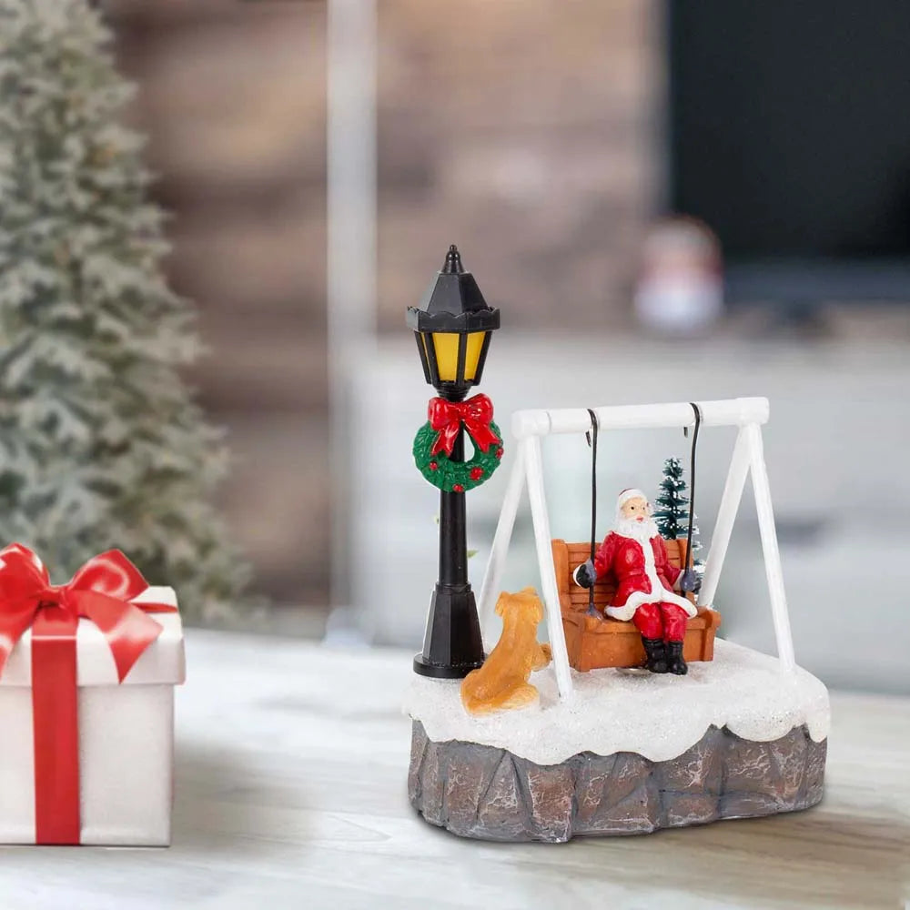 Sevair Deco Santa Swing Christmas Village Figurine angled gift table