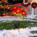 Sevair Deco Solar Poinsettia Lights for Christmas snowy lawn